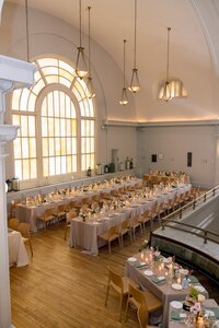 intimate-wedding-reception-candlelit-historic-hall-large