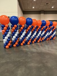 blue and orange balloon towers
