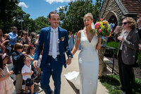 happy-couple-bubble-church-exit-kansas-city-wedding