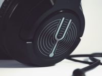 Custom therapy practice logo displayed on a headphone mockup