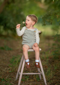 boy-child-portrait-on-wooden-chair-melbourne-gardens