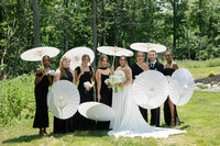 bride standing with her wedding party