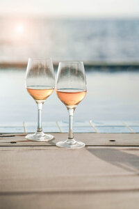 Two glasses of rosé wine overlooking the Mediterranean Sea
