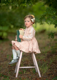 faye-girl-child-portrait-reading-in-garden-vermont