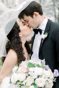 Bride and groom kissing portrait wedding reception at Nashville Tennessee venue — Weddings & Events by Raina