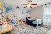 A MLS-friendly interior photo of a residential bedroom of a property for sale in Savannah, GA