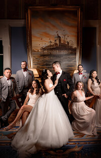 Wedding party posing in an ornate room at a Disney World wedding in Orlando