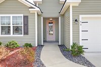 A MLS-friendly interior photo of a residential front door of a property for sale in Savannah, GA