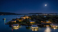 Professional aerial view of waterfront vacation rental on Possum Kingdom Lake