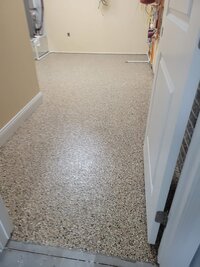 home-utility-room-epoxy-floor-after-iowa