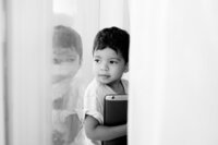 Candid black and white portrait of a child