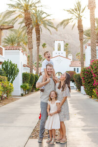 Homec family photographed together during a Palm Springs family session