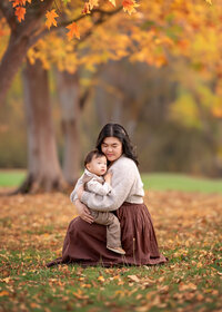 mother-holding-baby-bespoke-family-photography-melbourne