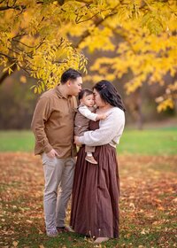 parents-holding-baby-autumn-family-photography-melbourne