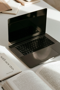 u6512682322_a_top_down_angled_shot_of_a_clean_workspace_on_a__a78c0290-414f-48aa-8af5-875d03895a68_0