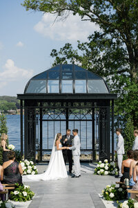 bride and groom saying "i do" in front of a ohio lake