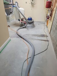 residential-utility-room-epoxy-floor-before-central-iowa