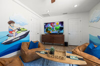gaming system with controllers for up to 4 players, plenty of seating and large board game table