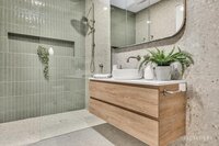 melanie-scaffidi-eltham-bathroom-green-tiles-timber-vanity