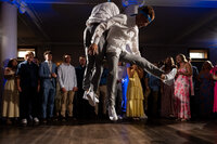 groom-brother-dancing-jumping-loretto-wedding-kansas-city