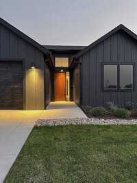 CanB Design- Curated Modern Build Project- Exterior-black-board-batten-textured-wood-door- Photo 3