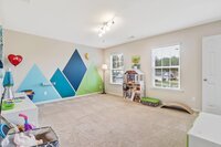 A MLS-friendly interior photo of a residential bedroom of a property for sale in Savannah, GA