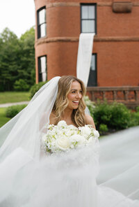 bride wrapped in veil at stevens osgood estate