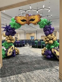 mardi gras balloon arch