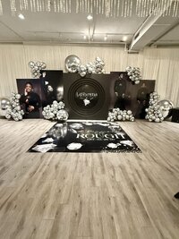 luxury balloon installation with giant photos and backdrops