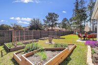 A MLS-friendly exterior photo of a residential backyard of a property for sale in Savannah, GA