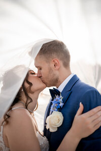 Bride and groom sharing a kiss at an Orlando wedding