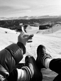 Powder - Cocktail toast with mountain landscape view below - TVS