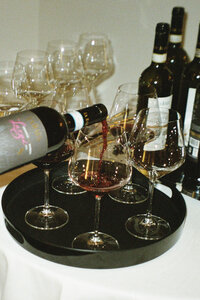 film photos of wine being poured