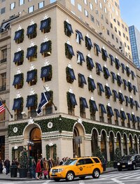 Fifth Avenue limestone façade decorated for Christmas in New York City.