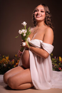 Woman posing during her professionally guided Avid Artistry boudoir photo session near Wichita, Kansas.