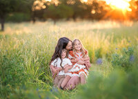 family-snuggling-sunset-wildflower-session-melbourne