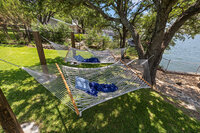 Relax in hammock heaven overlooking the beautiful blue waters of Possum Kingdom Lake with views to Hell's Gate