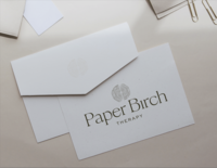 Paper Birch Therapy custom brand identity displayed on minimalist printed stationery