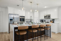 Chef's kitchen equipped with all the necessities for preparing meals for the entire family