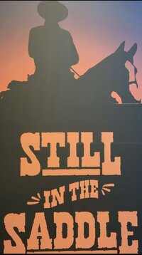 Still in the Saddle Banner