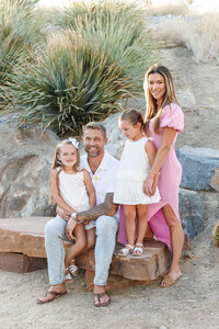 Young family posed together during a Palm Springs family photography session