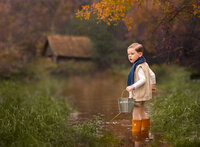 boy-child-portrait-with-duck-in-creek-melbourne-east