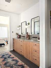 CanB Design- Curated Modern Build Project- Primary Bath-walnut-modern-slab-cabinets-green-sconces- Photo 16