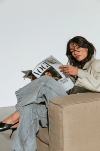 u6512682322_httpss.mj.runrhxQsj6LOPM_a_woman_sits_in_a_beige__b5738142-cdd7-4ef6-a82f-6ed0f4b78c7d_1