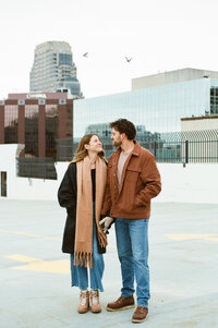 Michigan engagement photos on a parking garage roof