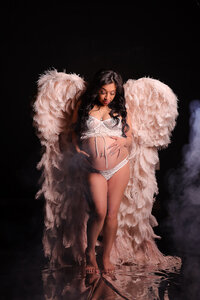 Maternity boudoir photography created by Avid Artistry in the Wichita area.