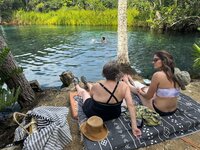 09_water_cenote-two-women-blanket_HERO_IMG_7313
