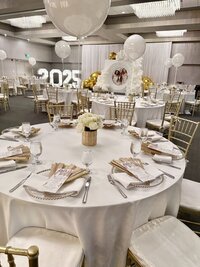 event planning and styling - white and gold tablesacape and balloons