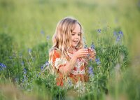 child-exploring-wildflowers-bespoke-family-photography