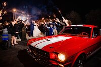 Wedding reception exit with Ford Mustang at Sycamore Farms Tennessee — planned by Weddings & Events by Raina